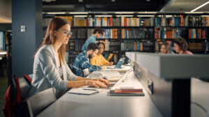 Students working in a library.