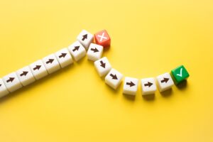 Arrows in a line face a blocker and take an alternative path