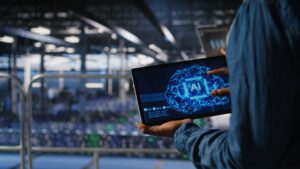 Tablet showing AI on the screen in an industrial setting